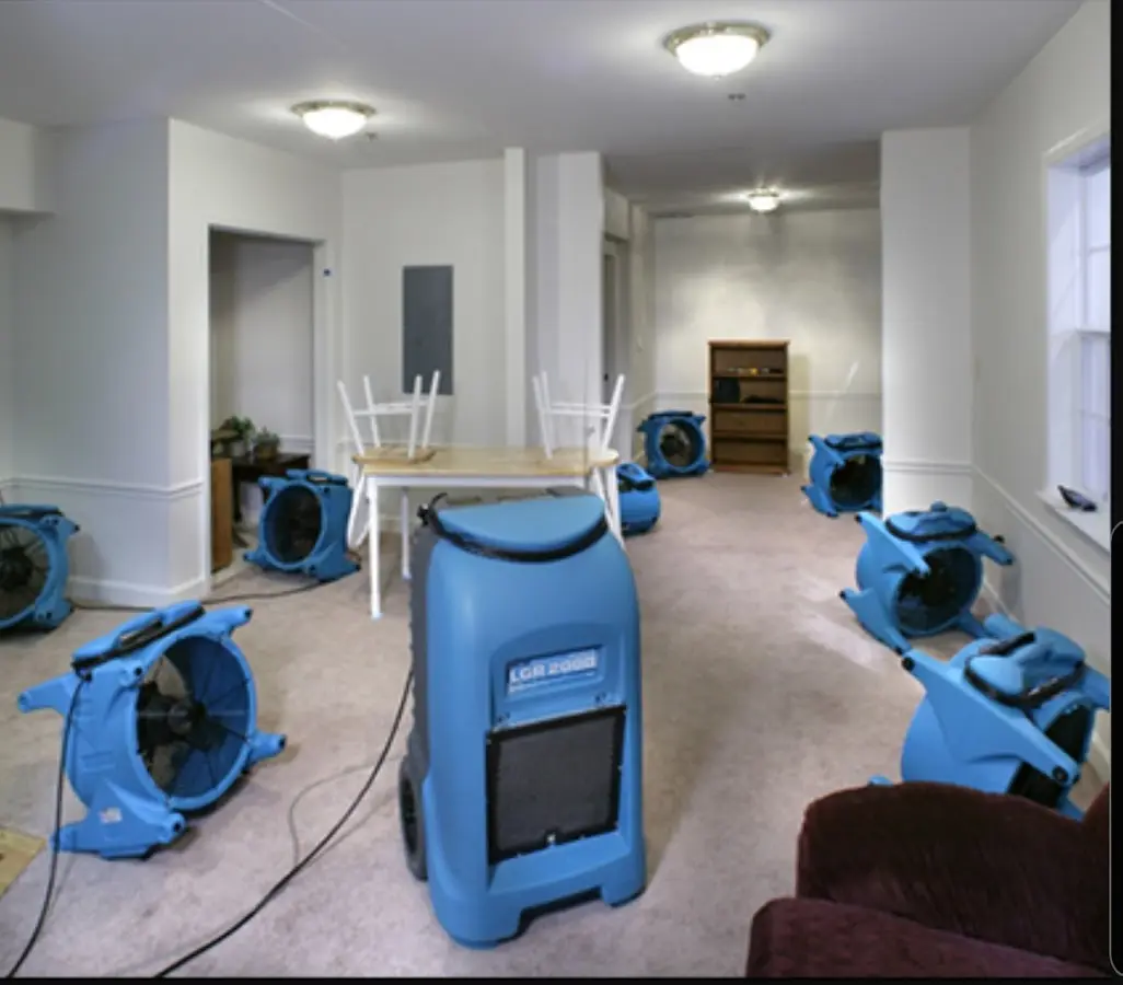 Air movers and dehumidifier setup for Water Damage Restoration in Midvale